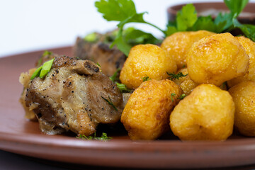 delicious baked meat with potatoes