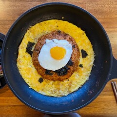 fried eggs in a frying pan