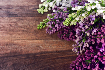 bouquet of lilacs on the background of a wooden board