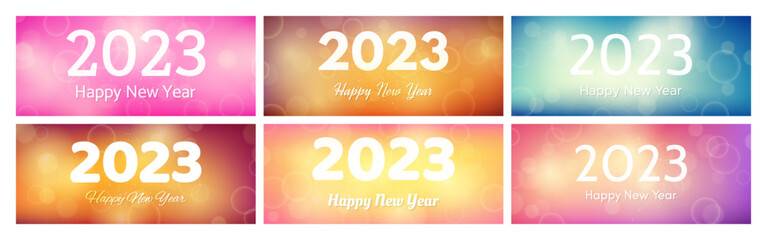 Happy new year 2023 incription on blurred background