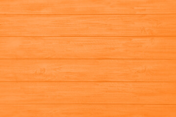 Fototapeta na wymiar Texture of orange wooden surface as background, top view