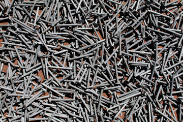 nail display steel nails pile background studio construction backdrop sales working building...