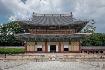Colorful traditional wood Korean architecture temple building main entrance gate Changdeokgung Palace in Seoul South Korea	