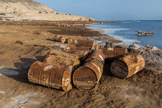 Old rusty barrels around saline lake Assal in Djibouti