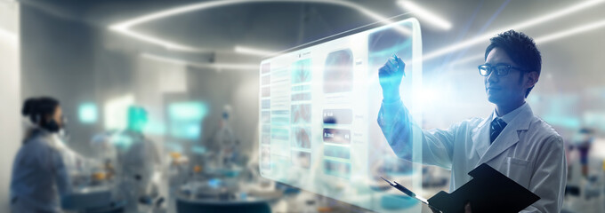 A researcher working in a future lab. Science technology. Wide image for banners, advertisements.