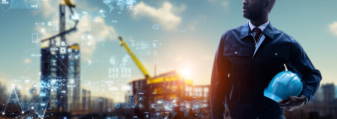 An engineer standing at a construction site and a digital data concept. Wide image for banners,...