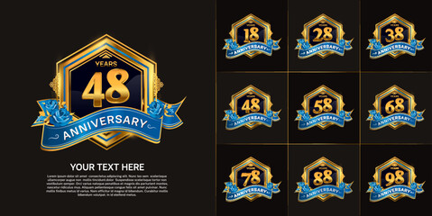 set of anniversary golden color with blue ribbon for celebration event
