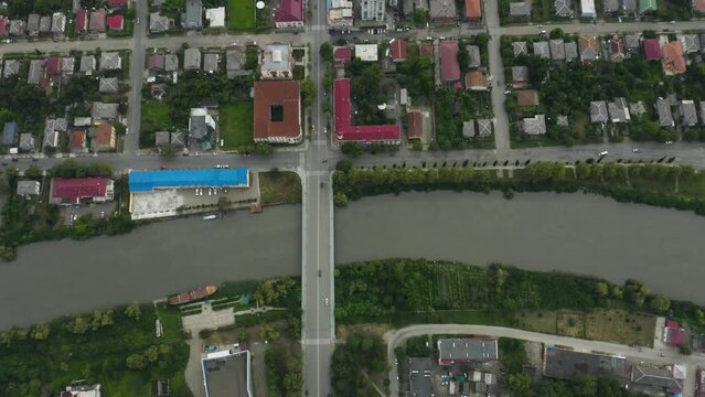 Aerial View Of Poti Bridge Over Rioni Canal In Georgia With Poti Cityscape. top-down drone
