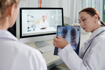 Doctors Discussing Lungs X-ray