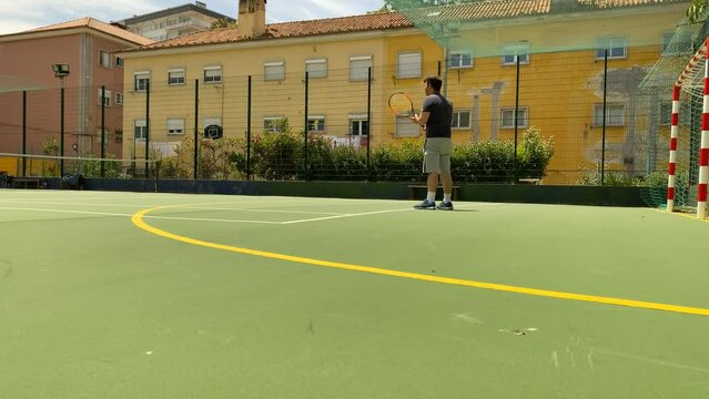 wide view of one professional tennis player waiting for the competition, Portugal, Lisbon