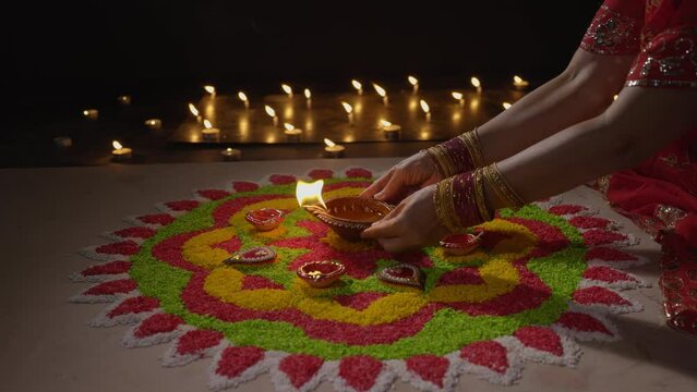 Traditional diya lamps lit during diwali celebration