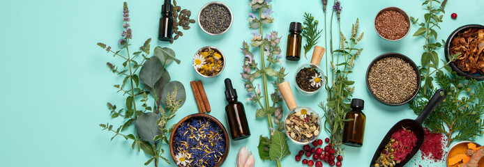Alternative herbal medicine on green background.