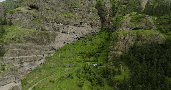 Amazing Landscape Of Historical Vani Caves Engrave In Mountains, Samtskhe-Javakheti Region Of Georgia. Aerial Drone Shot