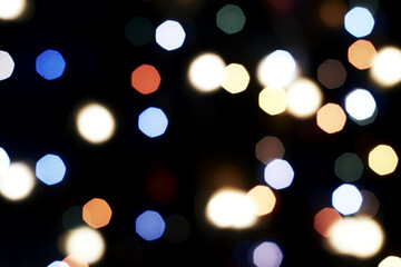 multicolored festive lights on a black background screensaver backdrop