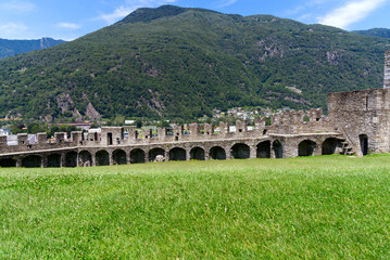 Obraz premium Scenic view of Unesco world heritage castle Castelgrande at City of Bellinzona, Canton Ticino, on a blue cloudy summer day. Photo taken July 4th, 2022, Bellinzona, Switzerland.