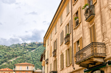 Fototapeta na wymiar Lake Como, Italy - July 4, 2022: Idyllic scenery on the streets and pathways around Lake Como, Italy 