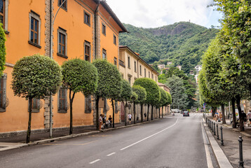 Fototapeta na wymiar Lake Como, Italy - July 4, 2022: Idyllic scenery on the streets and pathways around Lake Como, Italy 