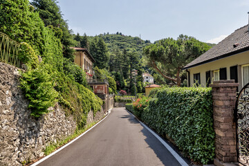Lake Como, Italy - July 4, 2022: Idyllic scenery and architecture on the streets and pathways around Lake Como, Italy
