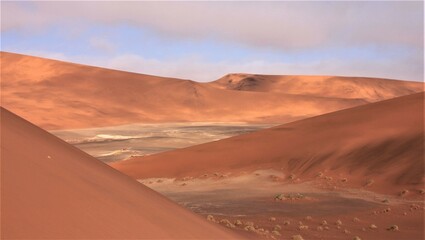 Fototapeta na wymiar The Orange Sand Dunes of Deadvlei, Namib Desert, Namibia