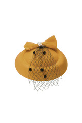 Close-up shot of a yellow felt pillbox hat decorated with a bow, beads and a veil. The fascinator hat with an alligator clip is isolated on a white background. Front view.