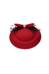 Close-up shot of a red felt pillbox hat decorated with a bow, beads and a veil. The fascinator hat with an alligator clip is isolated on a white background. Front view.