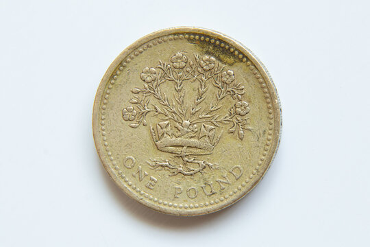 One British pound 1995, old coin on a white background, finance