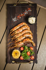 grilled shrimps with salad and sauce