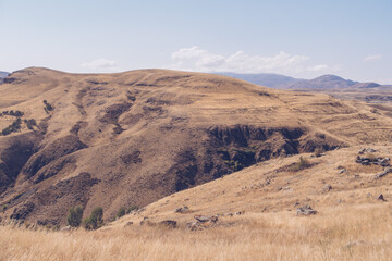 Picturesque Armenian autumn landscape in the backgrounds. Fields and meadows in the mountains of Armenia region. Stock photography