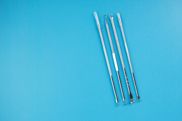 face cleaning tools, cosmetology device for skin cleansing, dermatologist accessories, face peeling, treatment, copy space