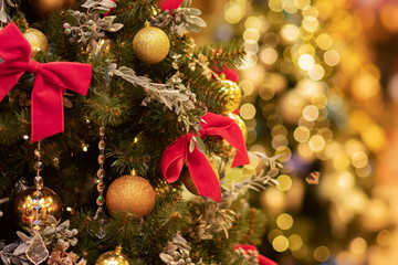Decorated Christmas tree on blurred background,magical atmospheric light