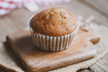 Banana Cake on wooden background, delicious sweet dessert cupcakes food or snack