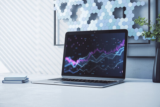 Close up of laptop with abstract glowing candlestick forex chart with index and grid on modern workplace background. Invest, trade, finance ans stock market concept. 3D Rendering. - Powered by Adobe