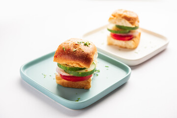 Mumbai style pav sandwich or leftover paav used for veg burger