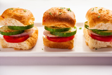 Mumbai style pav sandwich or leftover paav used for veg burger