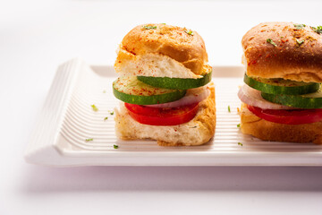 Mumbai style pav sandwich or leftover paav used for veg burger