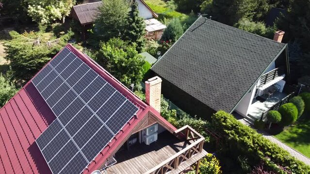 Garden and house with solar panels