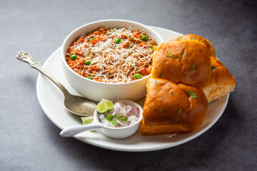 cheese Pav Bhaji Recipe is a  street food Bhaji-pav recipe with addition of cheese - obrazy, fototapety, plakaty
