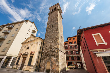 Fototapeta na wymiar Spilimbergo downtown, small ancient Church of San Giovanni dei Battuti (Saint John), 1346-1746. Pordenone province, Friuli-Venezia Giulia, Italy, southern Europe. 