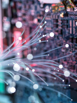 Fiber optic cables against computer mother board