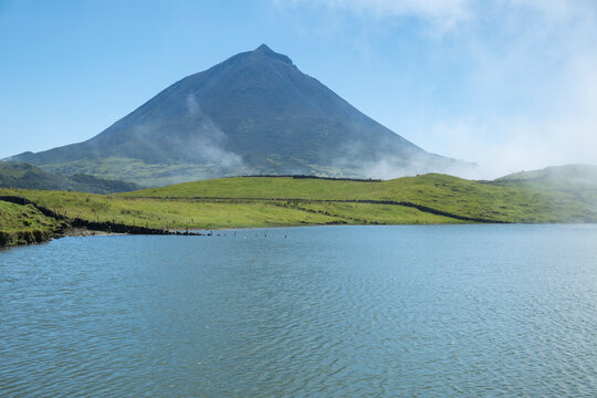 Portugal, Azores, Lagoa do Capitao with Mount Pico in background