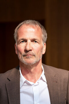 Senior businessman in blazer at office