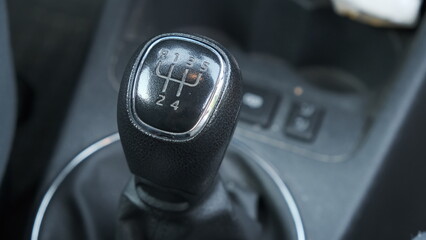 Manual transmission gear stick. Gear shift knob.Selective focus.