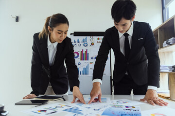 business people working together, Business teamwork and working on digital laptop computer with advisor showing plan of investment to clients at table office. Digital marketing.
