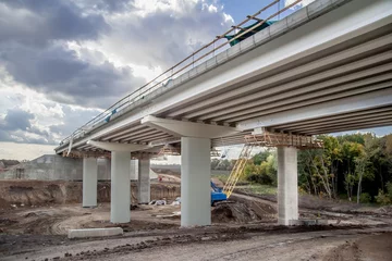 Fotobehang Concrete piers during bridge reconstruction. © Vitaliy