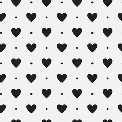 Vector seamless black and white pattern of dots and hearts.