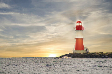 Ostsee - Meer - Warnemünde - Lighthouse - Sunset - Baltic Sea Vacation Coast - Tourism - Holiday - Background - Sunrise over sea - High quality photo