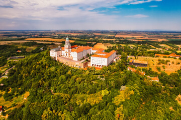 Aerial View of Pannonhalma Archabbey Hungary. Pannonhalma Abbey library interior in Hungary. UNESCO...