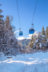 Obraz premium Ski resort Bansko, Bulgaria, cable car gondola