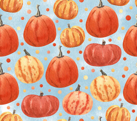 Watercolor seamless pattern with red and orange pumpkins on blue background. Great for fabrics, wrapping papers, wallpapers, covers. Autumn farming garden theme.