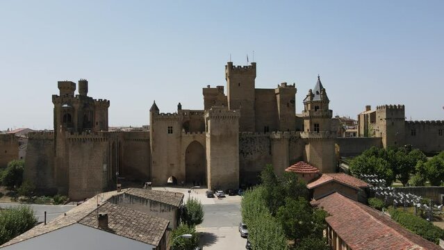 Beautiful view over a gothic castle on a warm summery day. Rising reveal.